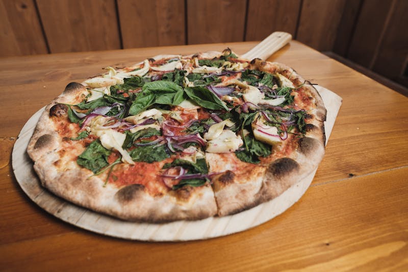 Truffle mushroom pizza with fresh thyme and truffle oil