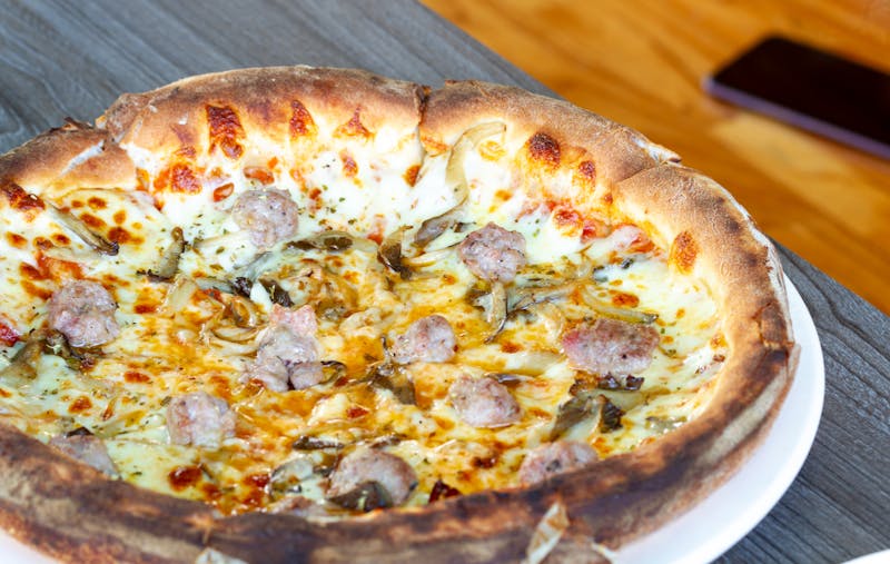 Spicy Arrabbiata pizza with Italian sausage