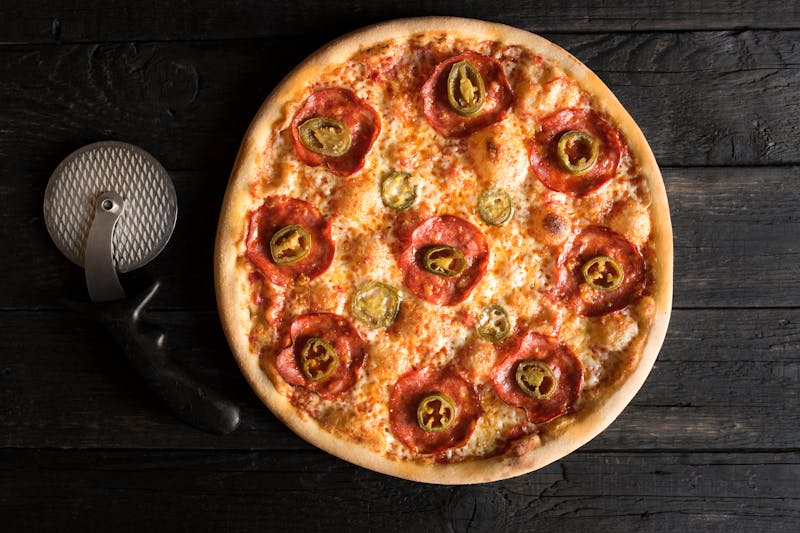 BBQ Chicken Pizza with smoky sauce and grilled chicken